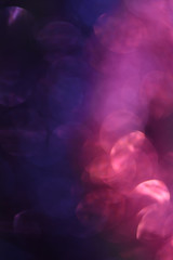 Large beautiful purple-blue bokeh vertical orientation. Glowing background, graphic resource, design, abstraction.