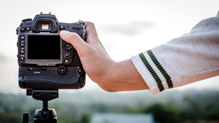 digital camera in hand