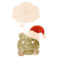 cute cartoon christmas bear and thought bubble in retro textured style