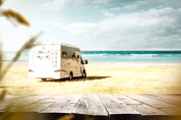 desk of free space and summer background of camping  - obrazy, fototapety, plakaty