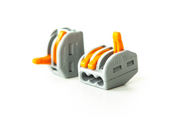 Fototapeta premium modern reusable electrical terminals on white background