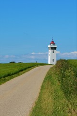 Fototapeta na wymiar lighthouse on coast of Denmark