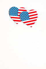American Independence day background with blue, white and red mixed stars and hearts. Celebration of American independence day, the 4th of July (the Fourth of July). Holiday concept. With copy space. 