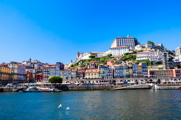 Fototapeta na wymiar View buildings in Ribeira District and Bishop's Palace in Porto on Iberian Peninsula