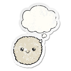 cartoon biscuit and thought bubble as a distressed worn sticker