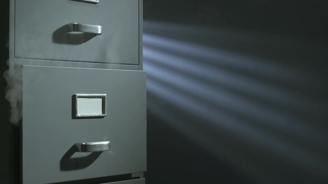 Dangerous burning documents in the filing cabinet