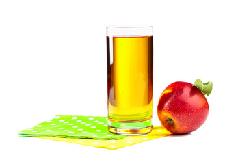 Glass of apple juice and red apple isolated on a white background.