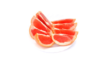 slices of grapefruit isolated on white background
