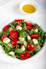 Purslane salad with tomatoes and cucumbers