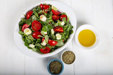 Purslane salad with tomatoes and cucumbers
