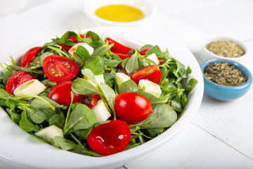 Purslane salad with tomatoes and cucumbers