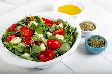 Purslane salad with tomatoes and cucumbers