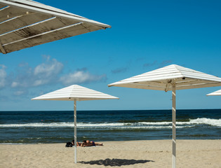 wooden sunshades on the beach