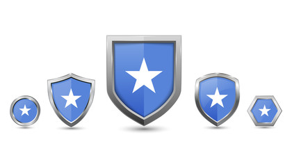 Set of somalia country flag with metal shape shield badge