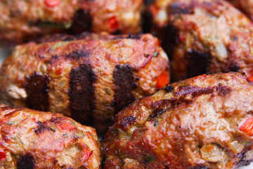Close up of grilled meat cevapcici balls