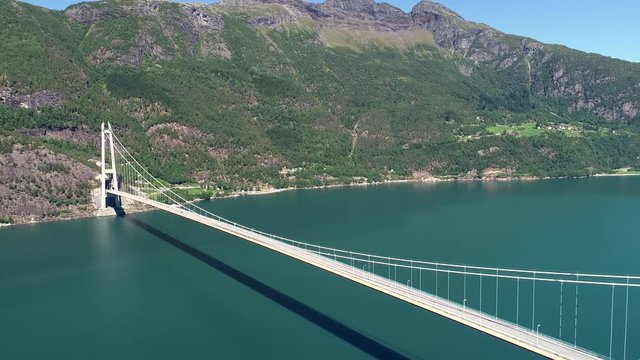 The Hardanger Bridge is a suspension bridge across the Eidfjorden branch of Hardangerfjorden in Hordaland county, Norway.