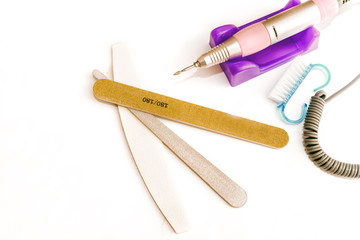 Manicure tool on white background close-up top view