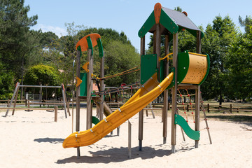 Children colored slides playground on a city park