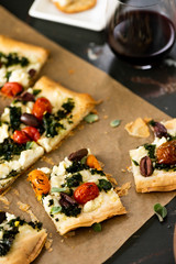 Phyllo Pastry Pizza on Brown Parchment Paper