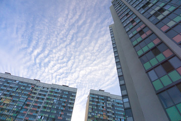 High-rise buildings against the blue sky