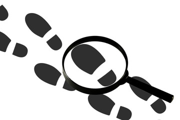 A magnifying glass against the background of footprints