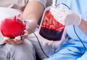 Patient getting blood transfusion in hospital clinic