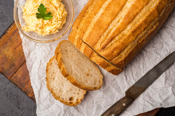 Slices of fresh bread for cooking Bruschetta. Top view