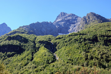 Naklejka na ściany i meble Closeup view of mountains scenes in national park Dombay, Caucasus