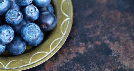 Healthy eating, diet, blueberries antioxidant fruits, snack foods on metal grunge background, web banner with copy space