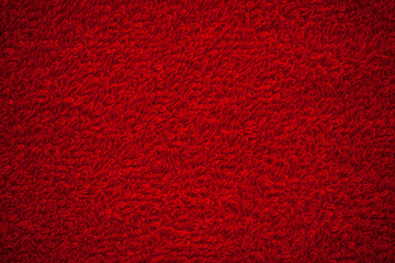 Red terry natural cotton towel background texture