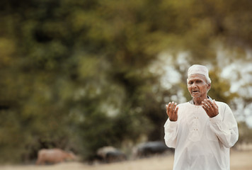Muslim man praying.Ramadan Kareem.