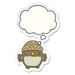 cute cartoon owl in hat and thought bubble as a printed sticker