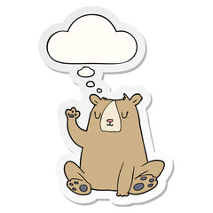 cartoon bear;waving and thought bubble as a printed sticker