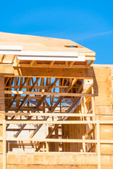 New apartment building under construction on sunny day on blue sky background