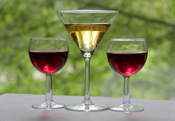 Vintage glass goblet on green background