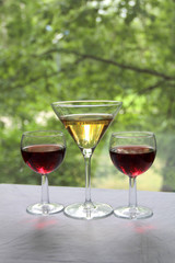 Vintage glass goblet on green background