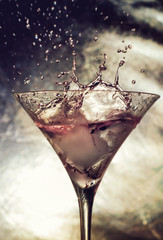 Cocktail with splashing liquid