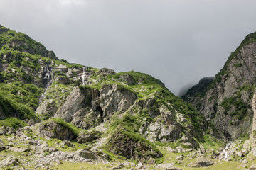 Closeup mountains scenes, walk to Trift Bridge in national park Switzerland