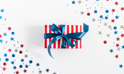 Obraz premium 4th of July American Independence Day. Happy Independence Day, decorations on white background. Flat lay, top view, copy space
