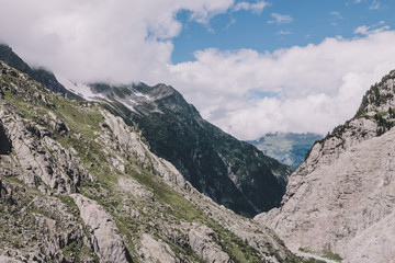 Panorama of mountains on route of Trift Bridge in national park Switzerland
