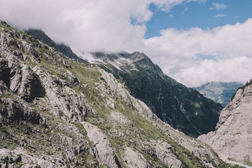 Panorama of mountains on route of Trift Bridge in national park Switzerland