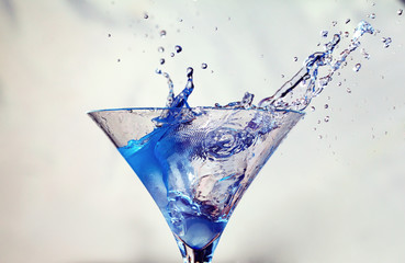 Cocktail with splashing liquid
