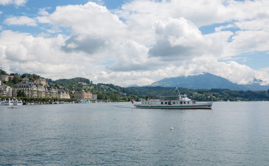 Fototapeta premium View on lake Lucerne, mountains and city Lucerne, Switzerland, Europe.