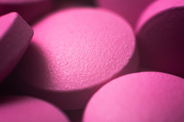 Many medication tablets and pills background. Close up. Macro tablets concept.