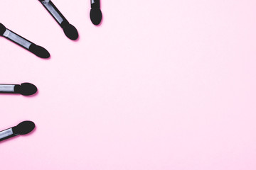 Set of black applicators.