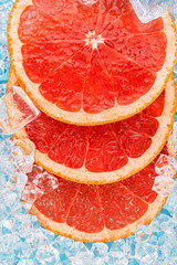 ripe grapefruit sliced on ice