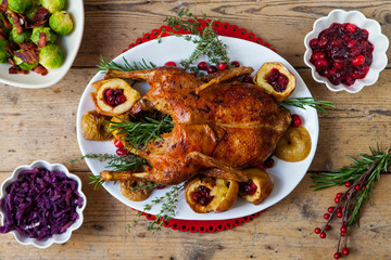 Festive roast duck with apples and cranberries