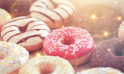 Sprinkled tasty donuts, close-up view