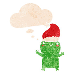 cute christmas frog and thought bubble in retro textured style