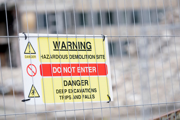 Demolition site building collapse hazard danger sign
